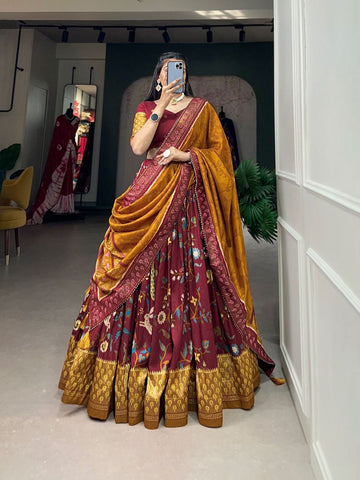 Maroon color Dola Silk with Foil Minakari Print Lehenga Choli