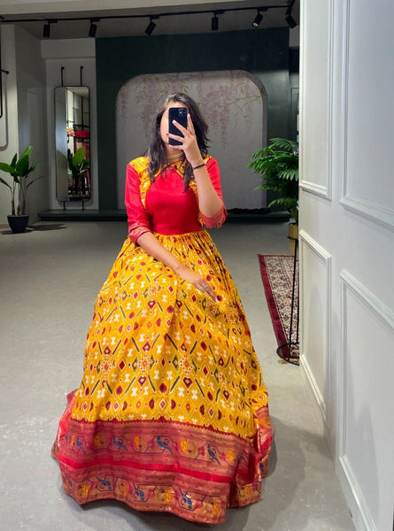 Presenting Yellow color Designer Dola Silk Long Gown