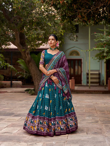 Teal Tussar Silk Lehenga Choli with Enchanting Ikat Patola Print and Foil Work